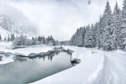 The cross country skiing tracks along the river in Champagny