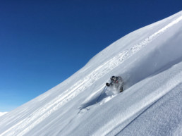 Off piste guide skiing the deep powder in Courchevel